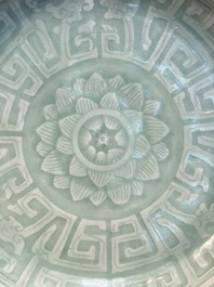 Three Chinese celadon-glazed plates with floral anhua design, 18/19th C.