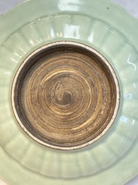 Three Chinese celadon-glazed plates with floral anhua design, 18/19th C.
