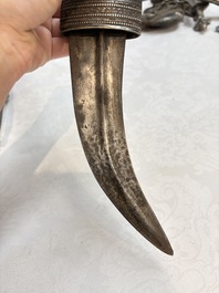Three Omani Khanjars, one with Rhinoceros horn hilt, 19th C.