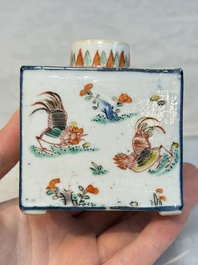 A pair of Chinese famille verte rectangular tea caddies and covers with fighting roosters, Kangxi