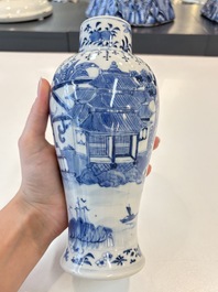 A Chinese blue and white garniture of five vases with landscape design, 19th C.