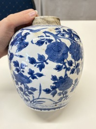 A Chinese blue and white 'birds among flowers' vase and cover, Kangxi