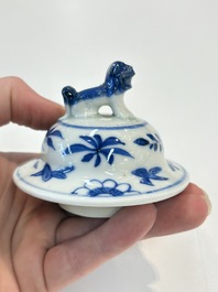 A Chinese blue and white garniture of five vases with landscape design, 19th C.