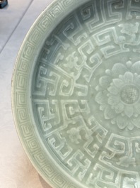 Three Chinese celadon-glazed plates with floral anhua design, 18/19th C.
