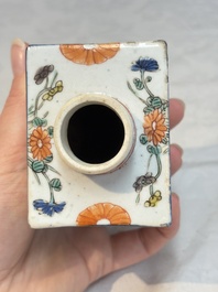 A pair of Chinese famille verte rectangular tea caddies and covers with fighting roosters, Kangxi