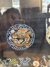 A fine Chinese kesi square 'dragon' panel and two silk embroideries with floral design, 19th C.