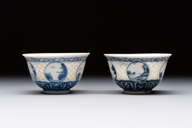 A pair of reticulated Chinese blue and white 'Hatcher Cargo' shipwreck bowls, Transitional period