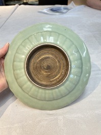 Three Chinese celadon-glazed plates with floral anhua design, 18/19th C.