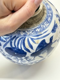 A Chinese blue and white 'birds among flowers' vase and cover, Kangxi