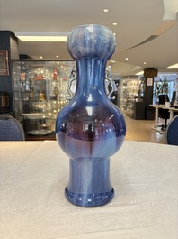 A Chinese flamb&eacute;-glazed garlic-mouth vase with ruyi handles, 19th C.