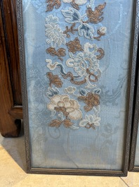 A fine Chinese kesi square 'dragon' panel and two silk embroideries with floral design, 19th C.