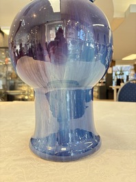 A Chinese flamb&eacute;-glazed garlic-mouth vase with ruyi handles, 19th C.