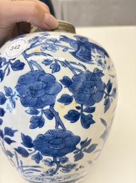 A Chinese blue and white 'birds among flowers' vase and cover, Kangxi