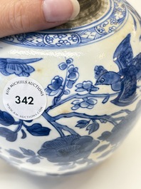 A Chinese blue and white 'birds among flowers' vase and cover, Kangxi