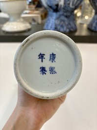 A Chinese blue and white garniture of five vases with landscape design, 19th C.