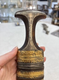 Three Omani Khanjars, one with Rhinoceros horn hilt, 19th C.