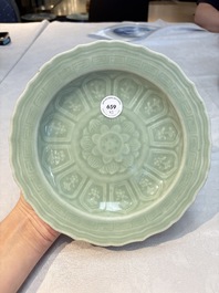 Three Chinese celadon-glazed plates with floral anhua design, 18/19th C.