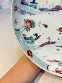 Four Chinese famille rose 'riverscape' plates and five 'flower basket' plates, Qianlong