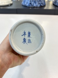 A Chinese blue and white garniture of five vases with landscape design, 19th C.