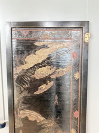 A Chinese Coromandel lacquered four-panel folding screen with mountainous landscapes, 17/18th C.
