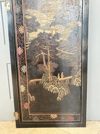 A Chinese Coromandel lacquered four-panel folding screen with mountainous landscapes, 17/18th C.