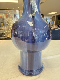 A Chinese flamb&eacute;-glazed garlic-mouth vase with ruyi handles, 19th C.