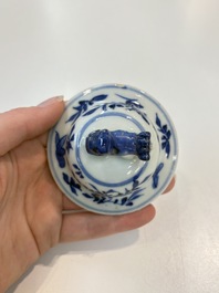 A Chinese blue and white garniture of five vases with landscape design, 19th C.