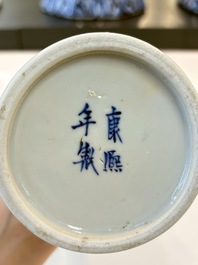 A Chinese blue and white garniture of five vases with landscape design, 19th C.