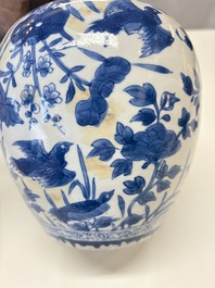A Chinese blue and white 'birds among flowers' vase and cover, Kangxi