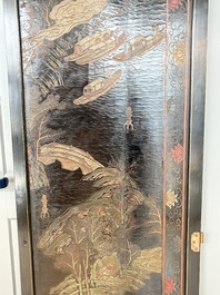 A Chinese Coromandel lacquered four-panel folding screen with mountainous landscapes, 17/18th C.