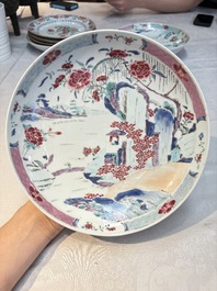 Four Chinese famille rose 'riverscape' plates and five 'flower basket' plates, Qianlong