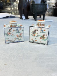 A pair of Chinese famille verte rectangular tea caddies and covers with fighting roosters, Kangxi