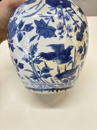 A Chinese blue and white 'birds among flowers' vase and cover, Kangxi