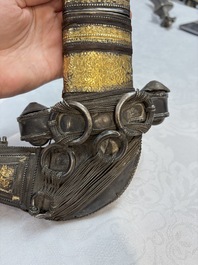 Three Omani Khanjars, one with Rhinoceros horn hilt, 19th C.