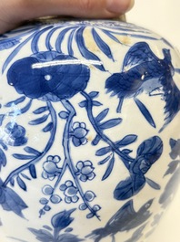 A Chinese blue and white 'birds among flowers' vase and cover, Kangxi