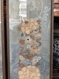 A fine Chinese kesi square 'dragon' panel and two silk embroideries with floral design, 19th C.