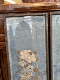 A fine Chinese kesi square 'dragon' panel and two silk embroideries with floral design, 19th C.