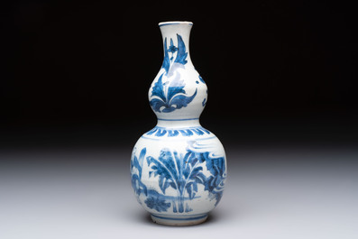 A Chinese blue and white 'playing boys' double gourd vase, Transitional period