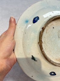 A polychrome Iznik pottery dish with stylised floral design, Turkey, ca. 1600
