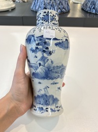 A Chinese blue and white garniture of five vases with landscape design, 19th C.