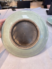Three Chinese celadon-glazed plates with floral anhua design, 18/19th C.