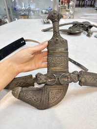 Three Omani Khanjars, one with Rhinoceros horn hilt, 19th C.