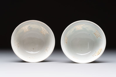 A pair of reticulated Chinese blue and white 'Hatcher Cargo' shipwreck bowls, Transitional period