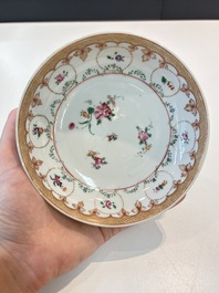 A Chinese famille rose 22-piece tea service with floral design, Qianlong