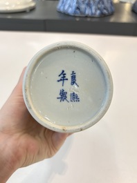 A Chinese blue and white garniture of five vases with landscape design, 19th C.