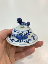 A Chinese blue and white garniture of five vases with landscape design, 19th C.
