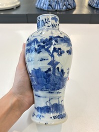 A Chinese blue and white garniture of five vases with landscape design, 19th C.