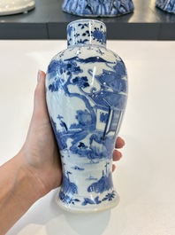 A Chinese blue and white garniture of five vases with landscape design, 19th C.