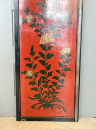 A Chinese Coromandel lacquered four-panel folding screen with mountainous landscapes, 17/18th C.