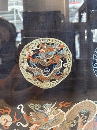 A fine Chinese kesi square 'dragon' panel and two silk embroideries with floral design, 19th C.
